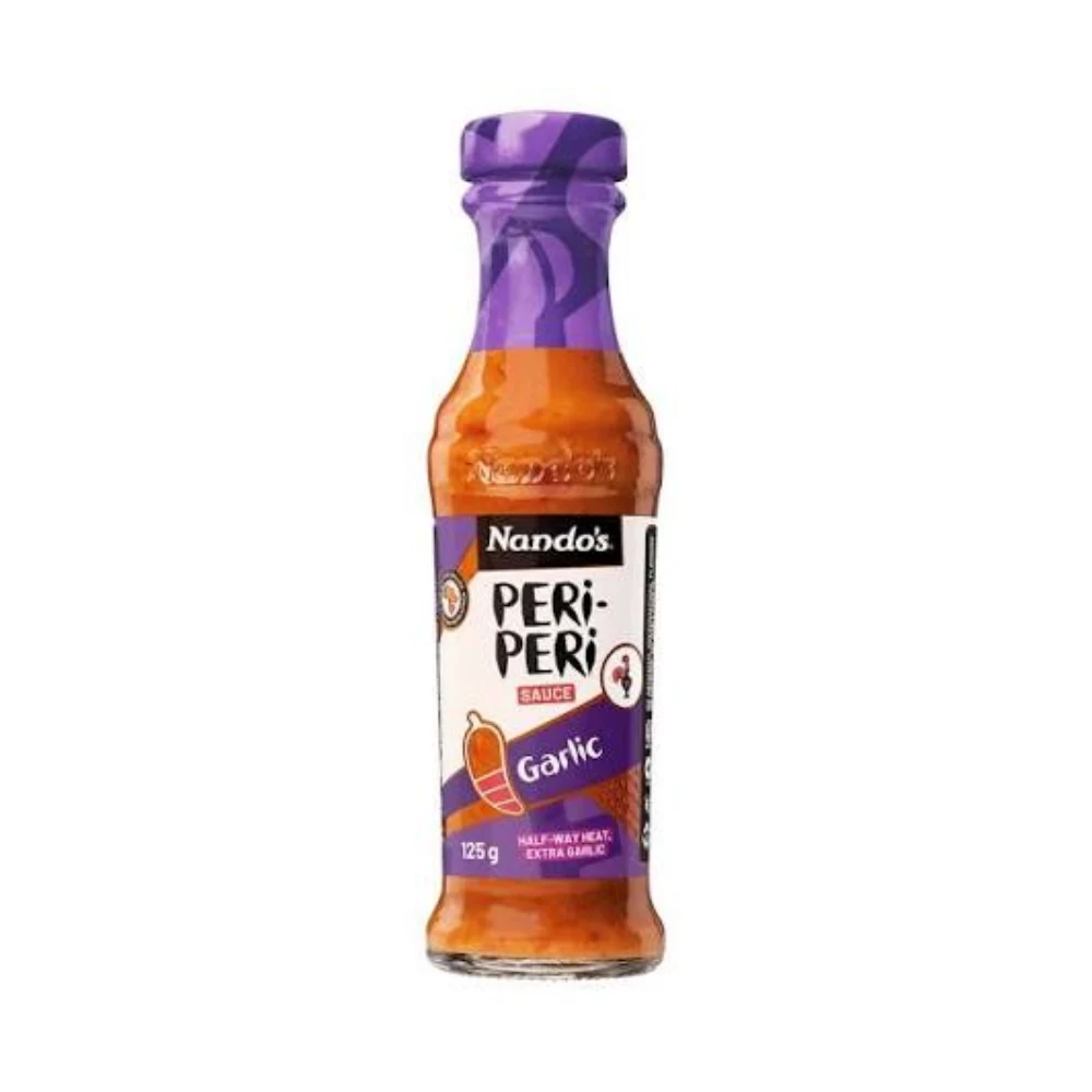 bbf7274a-61fc-470e-8a82-cced92d78a98.webp Nando’s Peri‑Peri Sauce Garlic - Image 1
